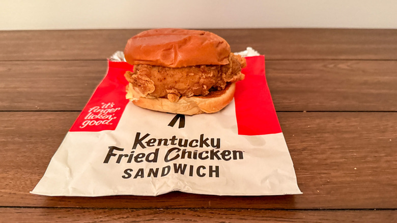 KFC's fried chicken sandwich on a fast-food takeout wrapper