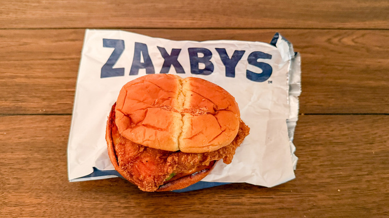 Zaxby's fried chicken sandwich on fast-food wrapper