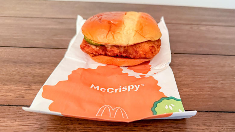 McDonald's fried chicken sandwich on a fast-food wrapper
