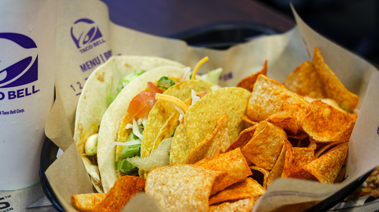 Taco Bell Meal with Soft Tacos, chips, and a beverage