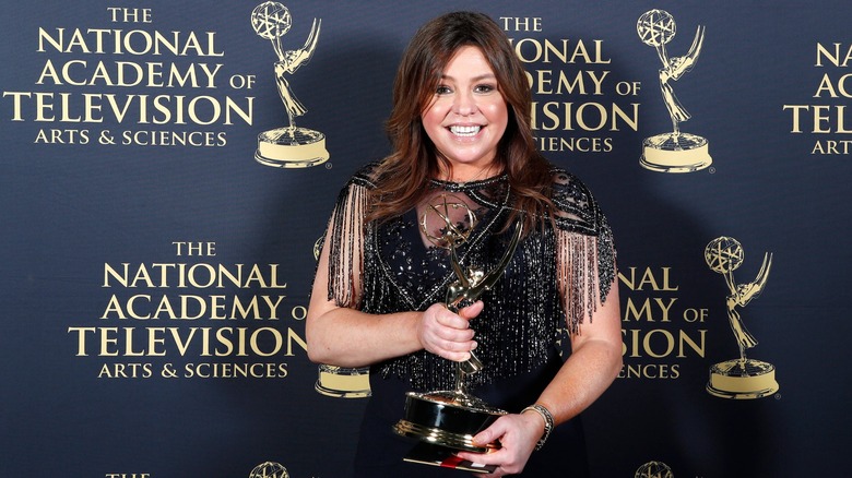 Rachael Ray, host of "$40 a Day with Rachael Ray" from Food Network, holding an Emmy award
