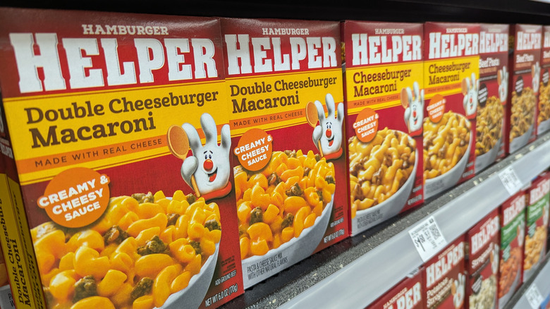 Row of Hamburger Helper Boxed Meals on Grocery Store Shelf