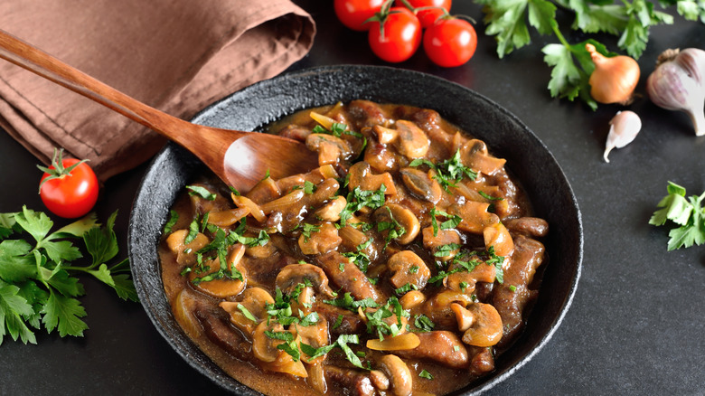 Beef stroganoff in a cast iron bowl
