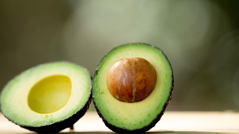 Fresh avocado cut in half