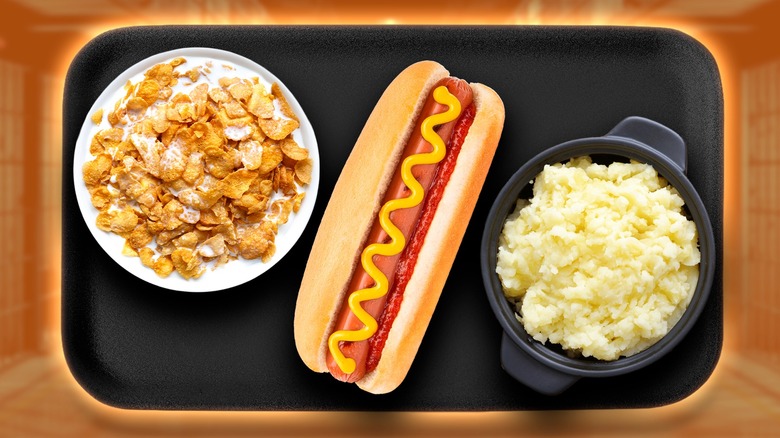 tray with cornflakes, hot dog, mashed potatoes