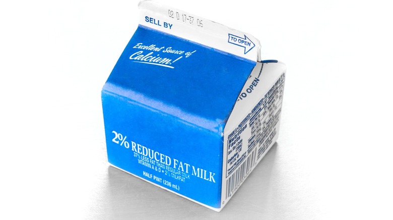 Milk carton on table