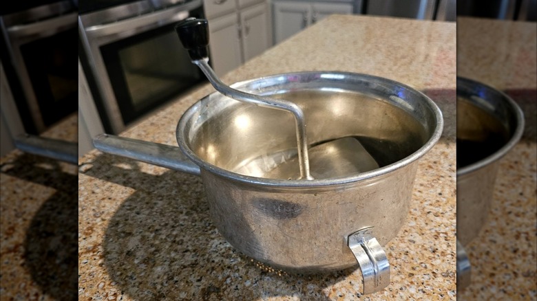 Foley Food Mill sitting on a kitchen counter