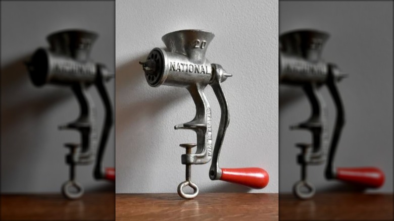 Vintage manual tabletop meat grinder
