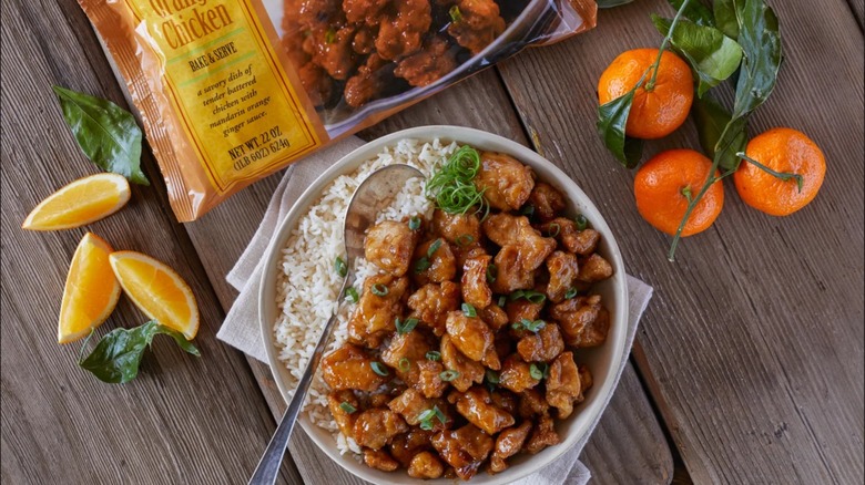 A package and bowl of Mandarin Orange Chicken from Trader Joe's