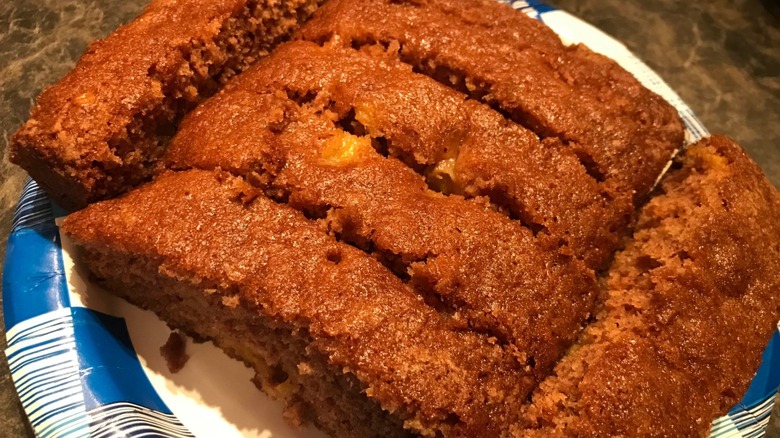 Slices of homemade mango bread on a paper plate in Hawaii