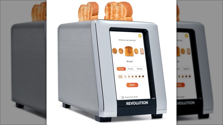 Revolution InstaGLO R180 Smart Toaster with two pieces of toast sticking out the top of the unit