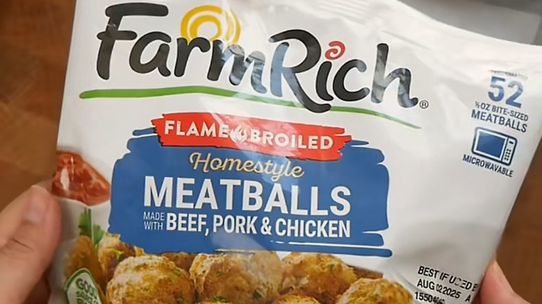 A closeup of the top half of a bag of Farm Rich flame broiled homestyle meatballs