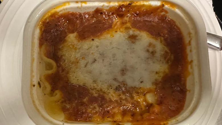 An overhead view of a cooked Stouffer's classic lasagna with meat & sauce in the plastic dish
