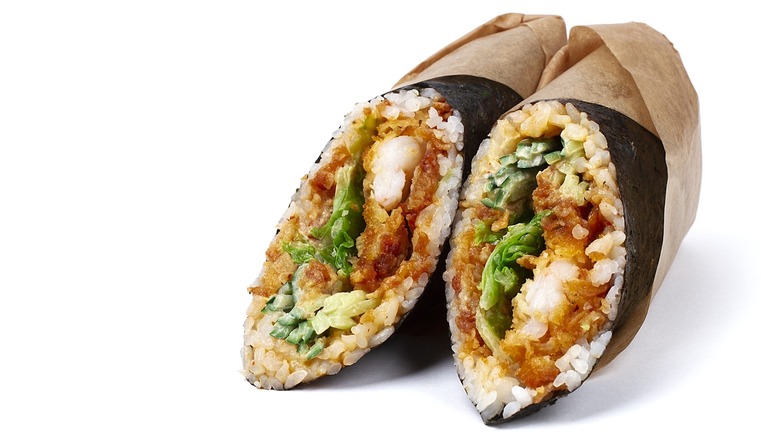 Sushirrito with shrimp rice, spicy sauce, cucumber, lettuce, and nori