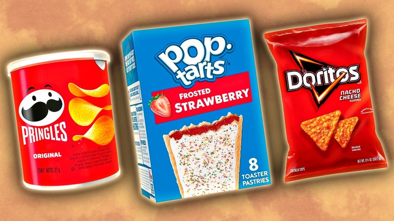 Short tub of Original Pringles, a box of frosted strawberry Pop-Tarts, and a packet of nacho cheese Doritos