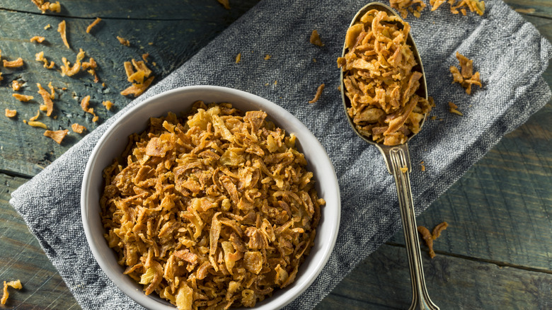 Golden fried onion bits ready to be used as a topping