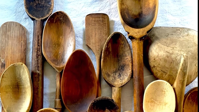 Collection of various, crude, handmade wooden spoons