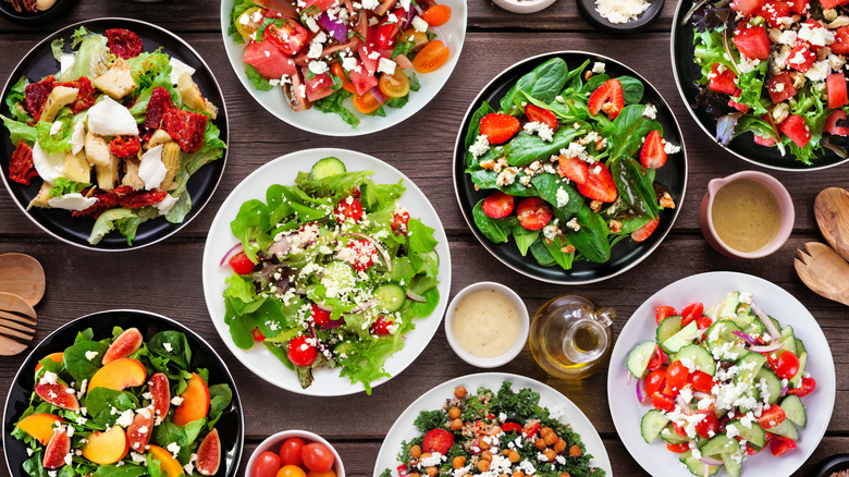 A variety of plated salads shot from above