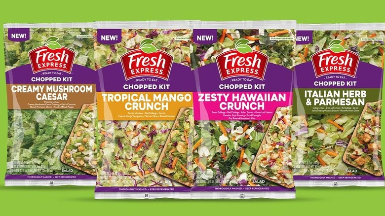Fresh Express line of salads on a green background