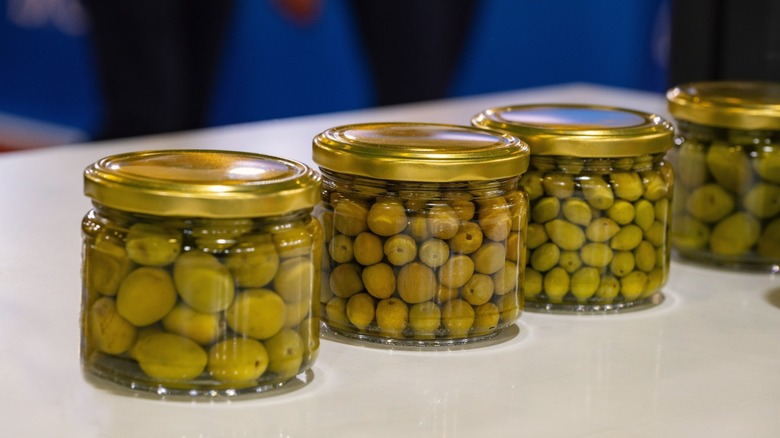 Cured olives in jars