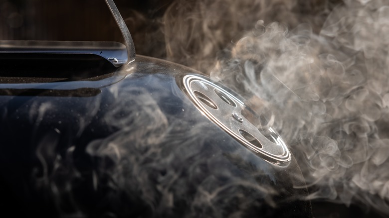 Smoke coming out of grill vents