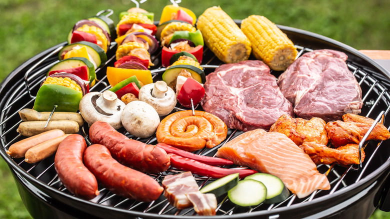 A lot of food on a grill