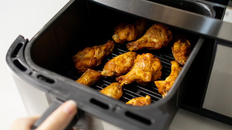 evenly spaced chicken wings in air fryer