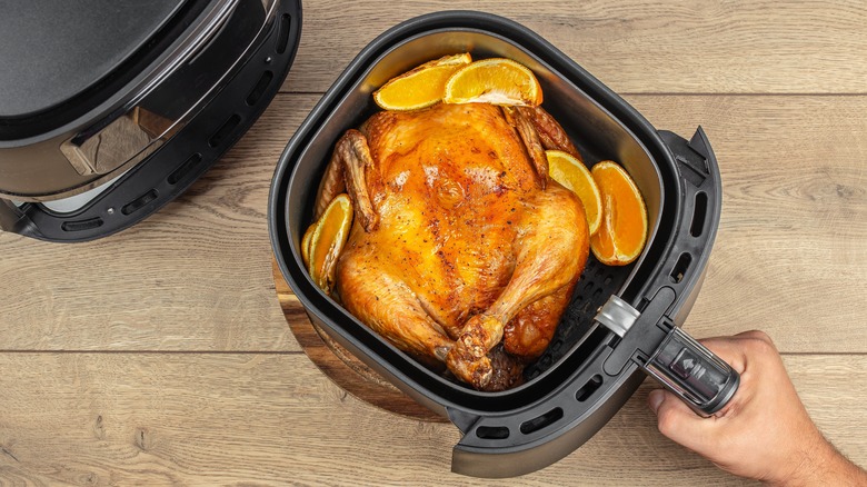 whole cooked chicken in an air fryer