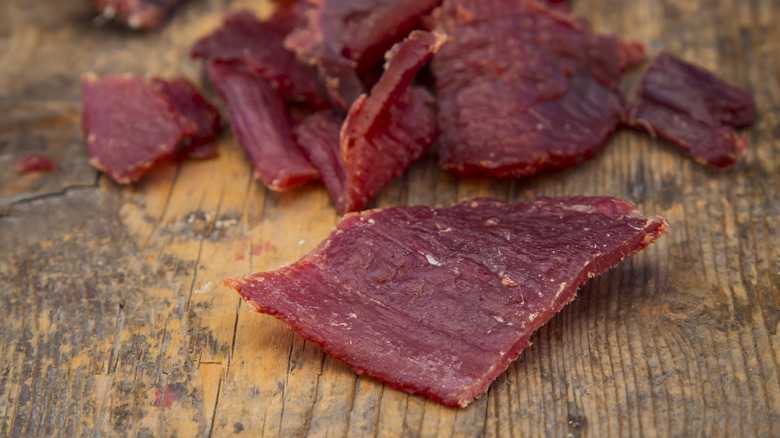 Beef jerky on a wood board