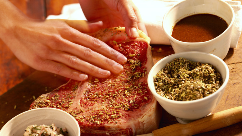 A seasoned cut of raw beef