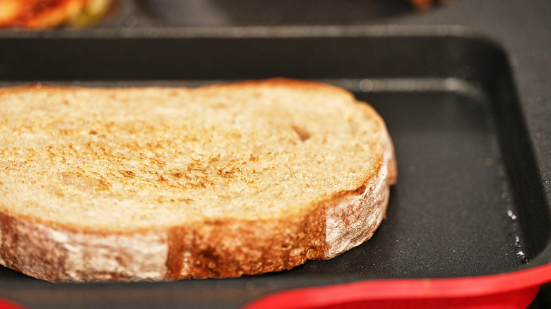 Toasting bread on pan