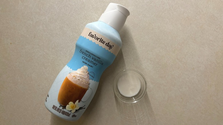 Favorite Day French Vanilla Non-Dairy Creamer bottle and creamer in glass ramekin on table