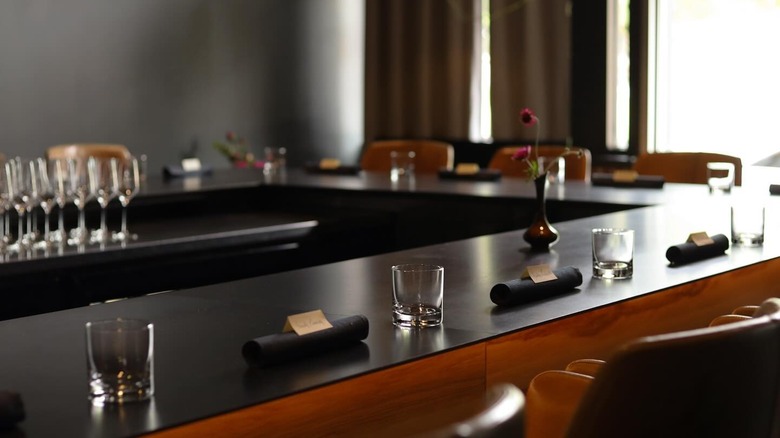 The dining room at Nonesuch in Oklahoma City, featuring a circular bar