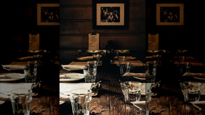 Interior dining room with long table at The Old Place in Cornell, CA
