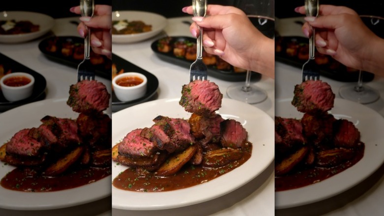 Sliced medium rare steak from Morton's The Steakhouse.