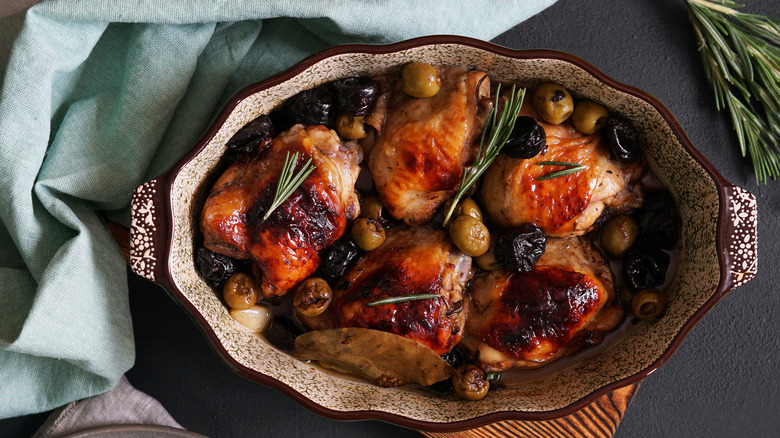 Chicken marbella in a serving dish