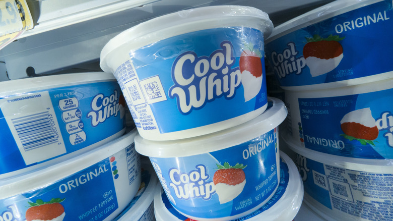 Containers of Cool Whip stocked in a store