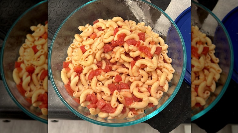 Glass bowl of macaroni and tomatoes