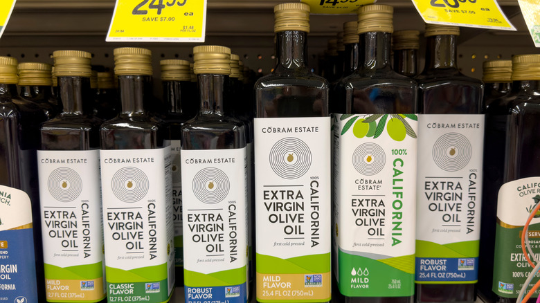 several bottles of cobram estate on display at store