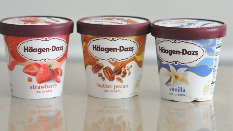 Three containers of Häagen-Dazs ice cream.