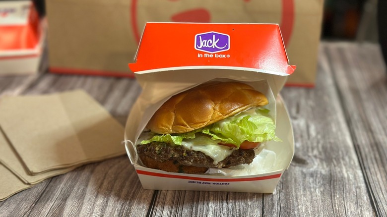 Bacon & Swiss Buttery Smashed Jack in a red box on table