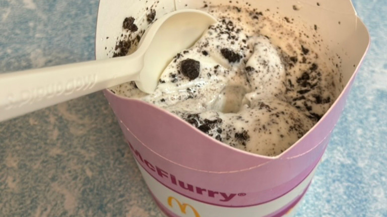 McDonald's Oreo McFlurry with a plastic spoon