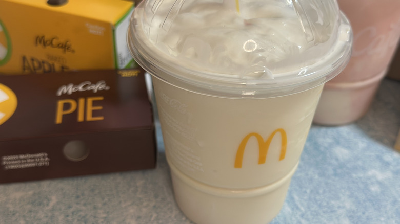 McDonald's Vanilla shake next to pies