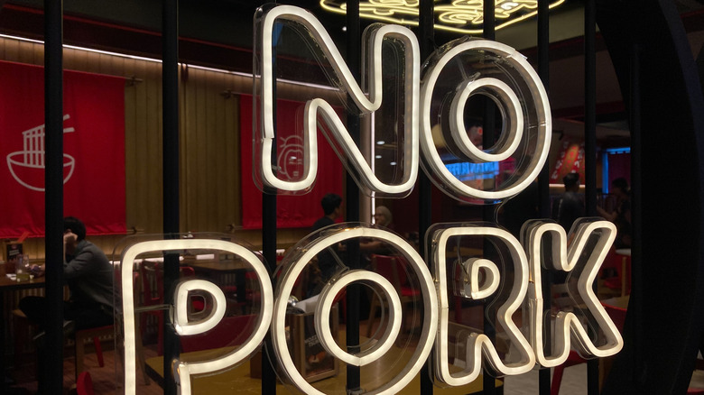 Pork signage display outside the restaurant.