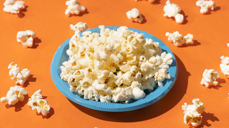 popcorn on a blue plate