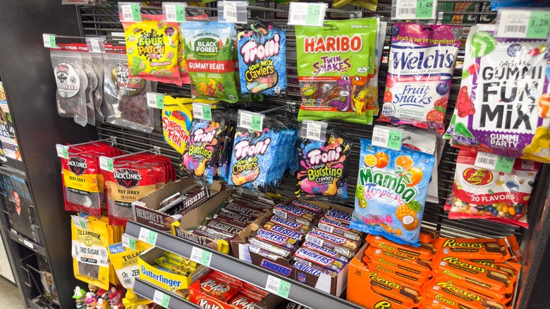 Impulse buy snacks and candy near checkout at grocery store