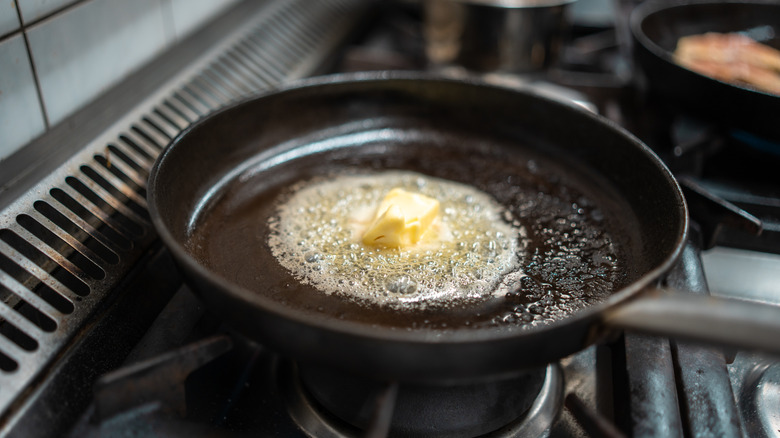 Butter melting in a non-stick pan