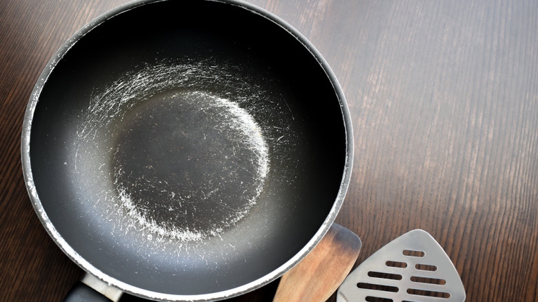 Small and overused non-stick pan with many scratches