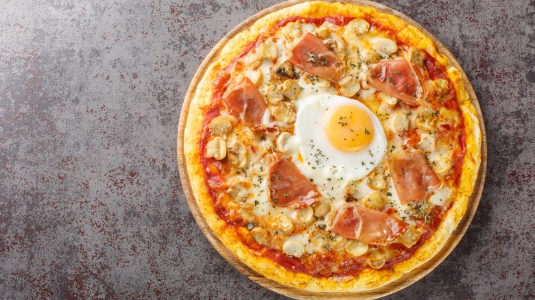 Egg on baked pizza