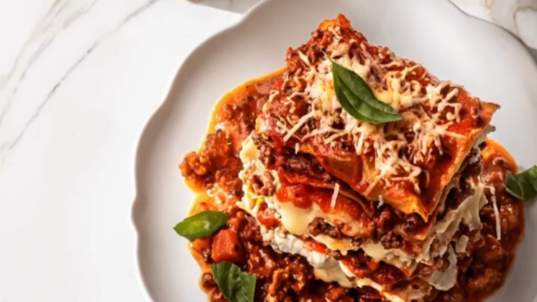 Slice of Maggiano's Little Italy Mom's Lasagna on a white plate